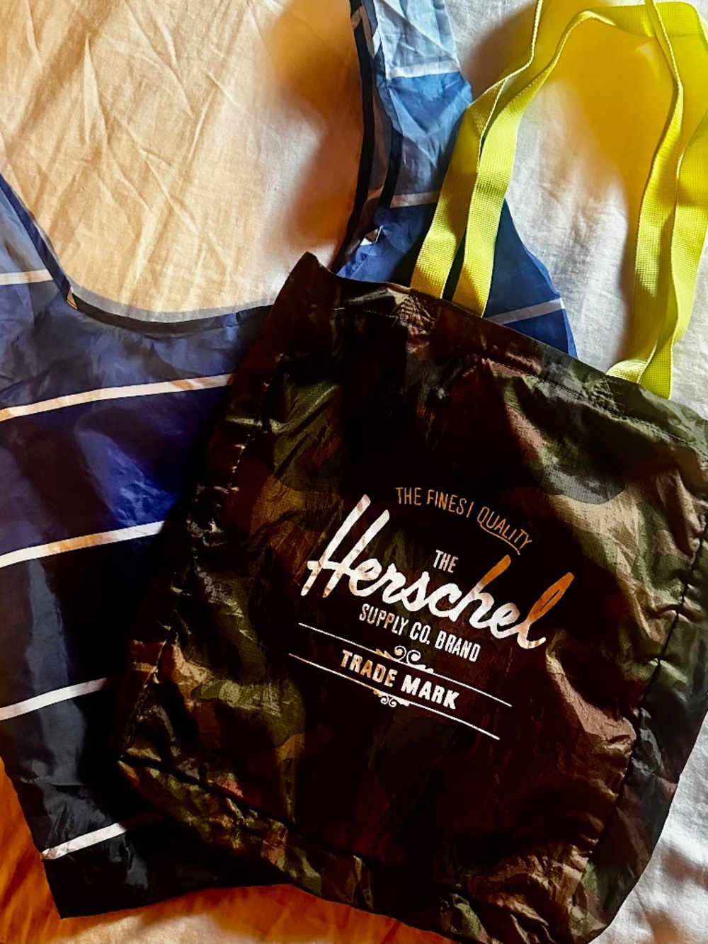 Foldable nylon tote bags (2) both with self fabric pouches